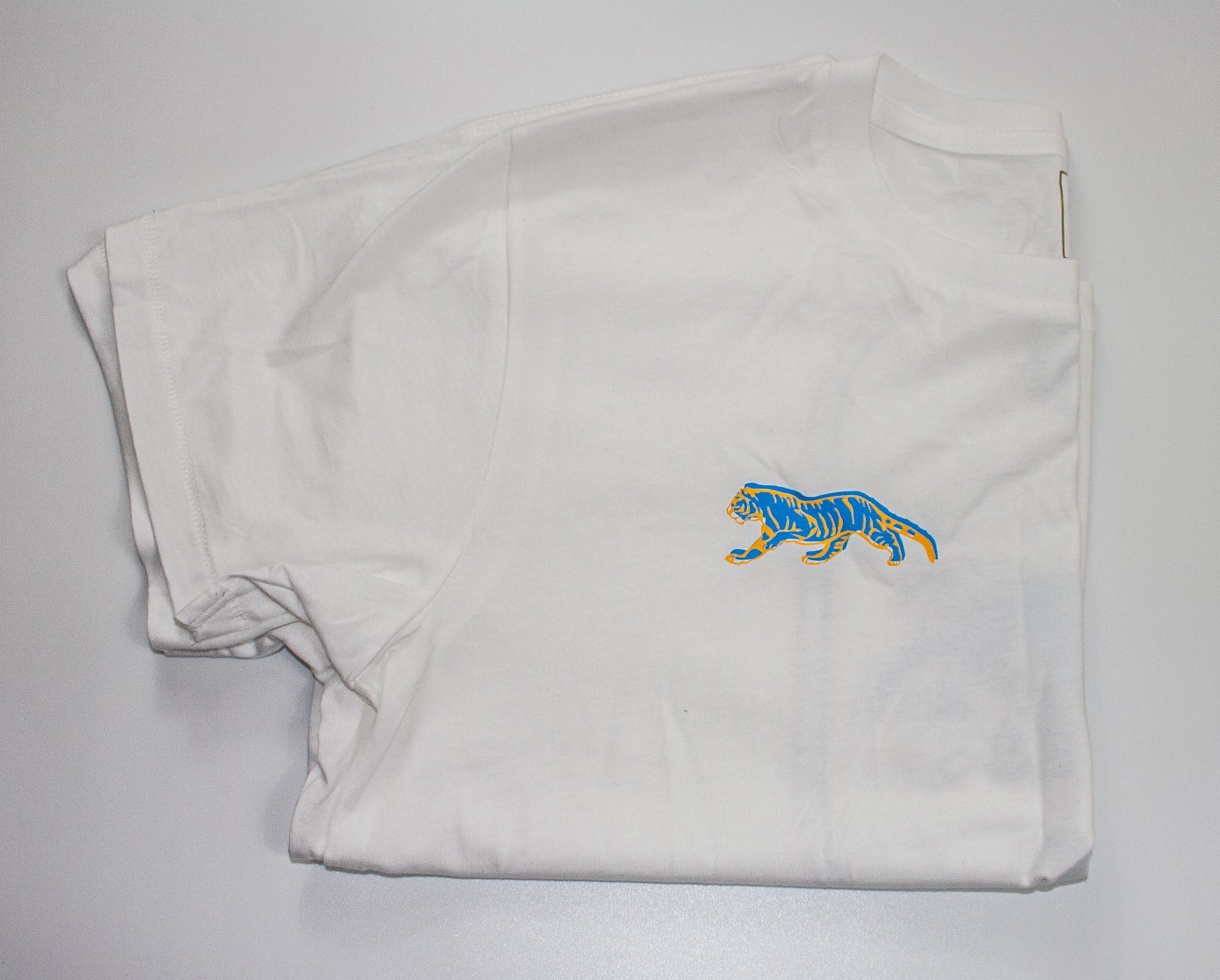 White Tiger T-shirt with Blue and Yellow Design