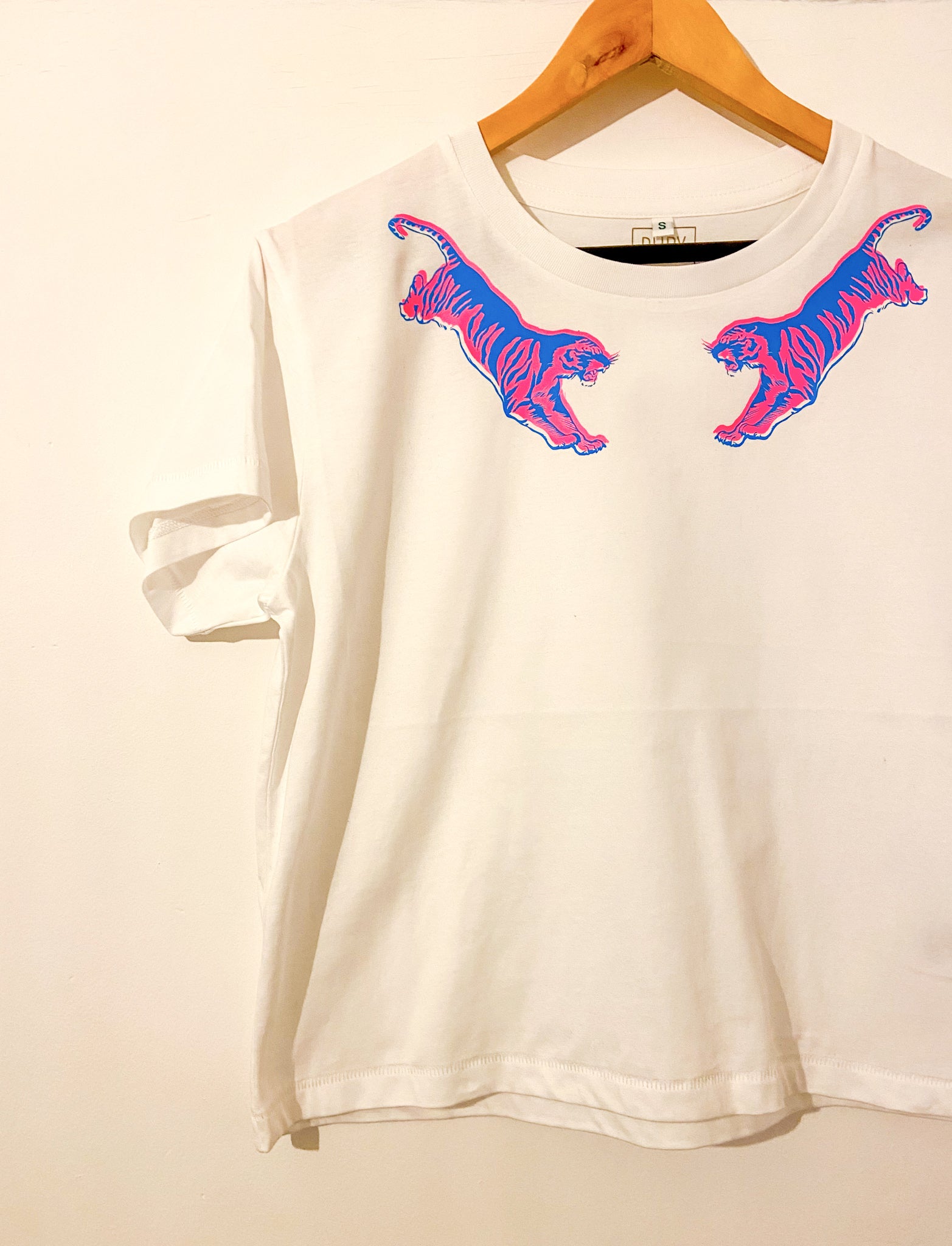 White T-shirt with Pink and Blue flying tigers