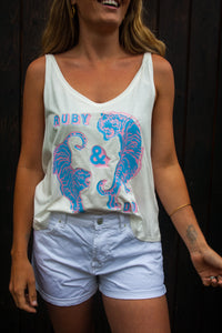 White vest with pink and blue circling tigers
